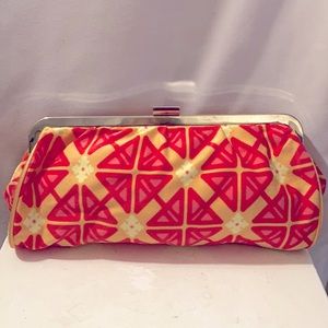 Yellow and pink clutch.